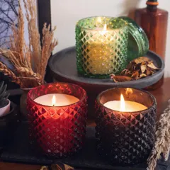 Our diamond-cut jar candles add a touch of vintage glamour to any room. The textured glass catches the light beautifully, creating a dazzling effect that enhances the warm glow of the soy wax candle within.