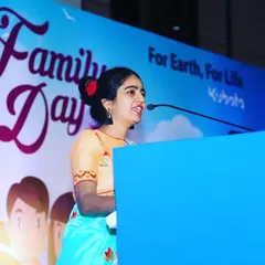On stage at the Kubota Family Day event. Addressing the employees and their families requires a warm and welcoming presence. My aim is to make everyone feel like part of one big corporate family for the day.
