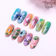 A vibrant collection of my gel-painted floral designs. Each flower is created with layers of color to give it depth and a realistic look.