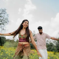 Running freely through a field of yellow flowers near Lonavala. I focus on capturing your natural energy and happiness.