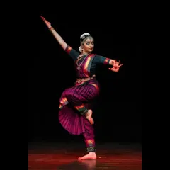 This is a dynamic pose from a traditional Bharatanatyam Margam, showcasing the energy and precision of the Thanjavur Bani style. The full araimandi (half-seated posture) and extended limbs are characteristic of the pure dance sequences, or Nritta, that I perform.