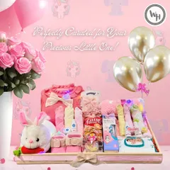 Perfectly curated for your precious little one. This pink-themed baby girl hamper is filled with an outfit, a soft bunny toy, hair accessories, and other adorable essentials.