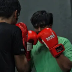 Two boxers drilling, completely focused on the task at hand. This is the kind of dedication you'll find everywhere in our gym.