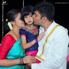 A tender family moment during a housewarming ceremony. We focus on capturing the emotional connections between family members amidst the traditional rituals.