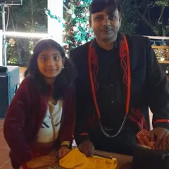 A photo with a young fan after a show. Seeing the excitement and wonder in a child's eyes is the biggest reward for any magician.