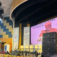 A wide shot of the stage during the Make in India 10-year celebration. Hosting such events involves coordinating with multiple stakeholders and adhering to a strict run-of-show.