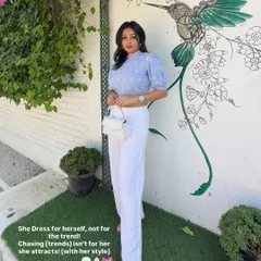 A classy woman dresses for herself, not for the trend. This all-white look with a puff-sleeve top and straight-leg pants is a perfect example of timeless, clean, and chic style.