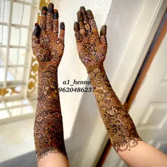 A complete view of Arfa's stunning bridal arms, showcasing the symmetry and complexity of the design.