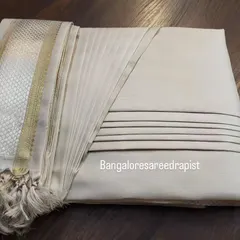 This is my signature box folding service, perfect for an engagement saree. The pleats are set and steam-pressed, and the saree is folded compactly, making it easy to store and ready to wear. This method protects the fabric and the pleats, whether you are storing it at home or traveling for a destination wedding.