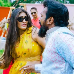 Capturing the candid moments of joy between guests at a destination wedding in Coonoor. The right music brings people together and creates these priceless memories.