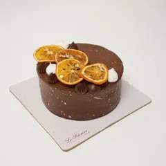A zesty twist on a classic. My Orange Chocolate Cake features moist chocolate sponge soaked in fresh orange juice, with an orange zest infused ganache for a bright, citrusy finish.