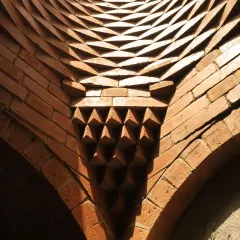 A close-up detail of the corbelled brickwork where the dome meets the arches. This shows the incredible precision and artistry of the masons who built this structure.