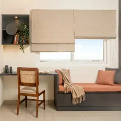I love transforming unused spaces into cozy, functional corners. This design combines a comfortable bay window seat with a compact study desk, perfect for reading or working with a view.