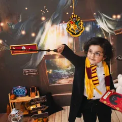 Mischief managed. For all the little wizards out there, my Harry Potter themed shoot is a dream come true. With a Gryffindor scarf, a magic wand, and a backdrop that feels straight out of Hogwarts, we can create some truly enchanting portraits.