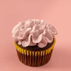 Another style of floral piping, showcasing the delicate, petal-like texture of the buttercream.