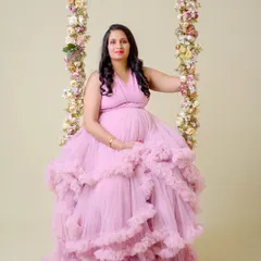 Our floral swing prop is a client favorite. Paired with a beautiful pink ruffled gown, it creates a whimsical and feminine portrait.