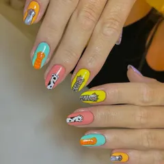 For all the cat lovers out there. This super cute set features different hand-painted cartoon cats on each nail, each with its own colorful background.