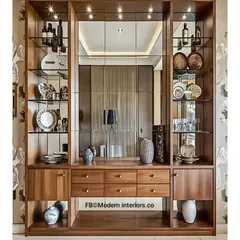 Elegant display goals! This large crockery unit features glass shelves, a mirrored back, and plenty of drawers, creating a stunning and reflective showcase for your finest pieces.