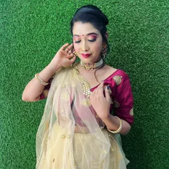 A perfect example of a glamorous reception or cocktail party look. This style features soft, elegant makeup with a modern updo, designed to be chic, comfortable, and last through a night of celebration.