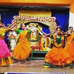Our students performing a Bharatanatyam piece at the Kanaka Purandara festival. The coordinated poses and colorful costumes bring the choreography to life.