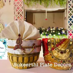 My custom-decorated Uppukudai, or ceremonial salt baskets. I design them to represent the bride and groom, using rich fabrics, mirror work, and elegant embellishments, adding a beautiful symbolic touch to wedding rituals.