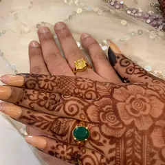A close-up of the beautiful henna stain after the paste has been removed. This floral design for an engagement shows the rich, dark color that my natural henna produces.
