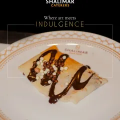 Where art meets indulgence. A simple, beautifully plated crepe drizzled with chocolate showcases our philosophy of turning every dish, no matter how simple, into a work of art.