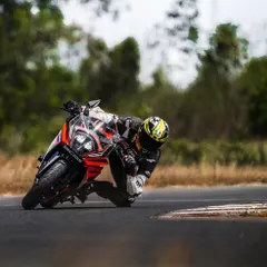 A rider on a KTM RC getting a feel for the limit. Our track days provide a safe space to explore your bike's capabilities without the dangers of the street.