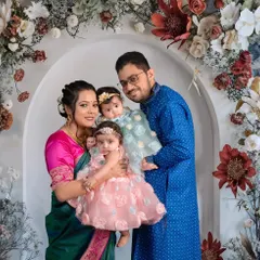 A slightly different angle from the same family session, capturing a more interactive and candid moment. This shows how we take a variety of shots to ensure we get that one perfect expression.