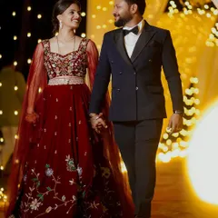 A stolen moment between the happy couple at their reception. My team and I focus on creating an atmosphere where you can relax and be yourselves, allowing us to capture the authentic joy of your celebration.