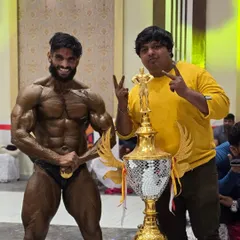 The goal is not just to compete, but to win. Here is one of my champions with his title trophy. This is the result of pure dedication and trusting the process.