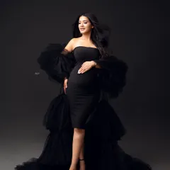 Learn to create glamorous, high-fashion maternity portraits like this one from a recent workshop. I'll guide you through using dramatic studio lighting and posing techniques to make your clients look and feel incredible.