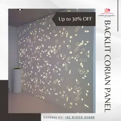A modern backlit Corian panel featuring a scattered pattern of small geometric shapes. When illuminated, the wall comes alive with a gentle, sparkling glow, creating a unique ambient feature.