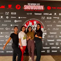 Supporting my team of female athletes at the WNBF Singapore competition. As a coach, I'm there for my clients every step of the way, from the gym to the backstage pump-up.