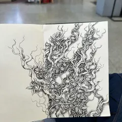 A sketchbook drawing of tangled vines and leaves, creating a dense and chaotic natural pattern. This kind of texture can be incorporated into larger, more complex tattoo designs.
