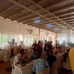 The tournament is in full swing at a community clubhouse. We use the Swiss format to ensure that players are matched with opponents of similar skill levels throughout the event.