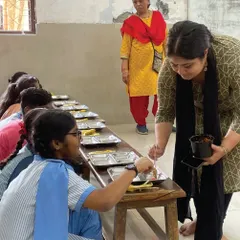 This is our partnership in action. The Khaana Chahiye Foundation serves meals to those in need, including these students. We are proud that every book purchased helps support their community kitchens run by transgender collectives and women's self-help groups.