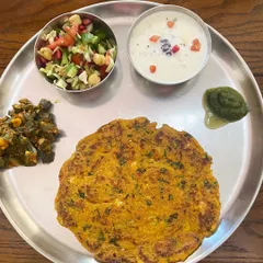 Here is another one of my favorite thalis for breaking a fast. It includes a spinach paneer roti, okra with peanuts, a fresh chickpea salad, and mixed vegetable yogurt. A truly nourishing and satisfying meal.