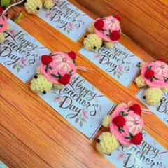A closer look at the Teacher's Day turtle keychains. The shells are decorated with a pink flower design, adding a sweet, detailed touch.