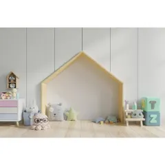 A minimalist and playful corner in a child's room. The house-shaped floor nook creates a perfect spot for reading and imaginative play, surrounded by soft toys and simple, modern furniture.
