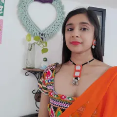 Modeling two of my favorite handmade necklace sets. The first is a bold orange mirror work set for a garba night, and the second is a more subtle blue and white mirror set that pairs beautifully with a silk saree.