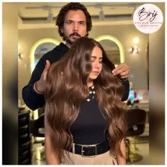 A closer look at this gorgeous brown balayage, showcasing the soft waves and healthy shine that make the color pop.