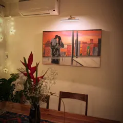 It is incredibly rewarding to see a commissioned painting in its new home. I created this piece for a client in Singapore, capturing a personal moment against the city's sunset, turning their cherished memory into lasting wall art.