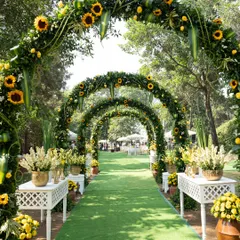 A pathway of dreams for a sun-kissed Haldi. We design immersive entrances like this series of sunflower arches to build excitement and create a stunning, poetic welcome for you and your guests.