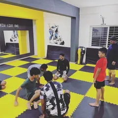 A group of our younger students listening and learning a new technique. I focus on making Jiu-Jitsu engaging and understandable for all age groups.