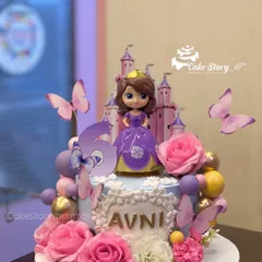 A royal celebration for Avni's 5th birthday with this Princess Sofia cake. The design includes a beautiful Sofia figurine, a castle backdrop, fresh pink roses, and delicate butterflies.