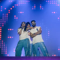 A cool, relaxed moment on stage during a hip-hop flavored performance. This shows our versatility in choreographing different styles, from Bollyhop to contemporary, to fit the vibe of any song or artist.