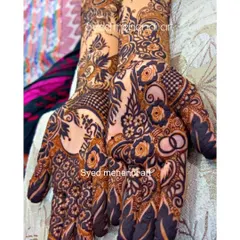 Another view of the engagement design, showing the full hands.