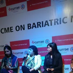 On stage for a Continuing Medical Education (CME) event focused on Bariatric Nutrition. These sessions are vital for sharing knowledge among healthcare professionals to improve patient support.