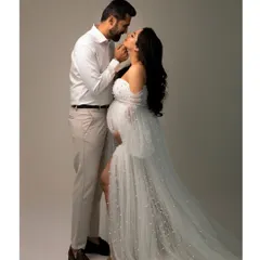 The quiet moments between two people before they become three are so precious. This elegant couple's portrait captures the love and anticipation that fills the air during a maternity session.